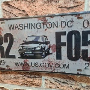 TIN METAL SIGN EMBOSSED