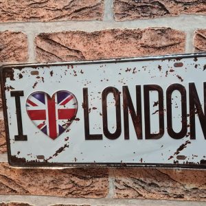 TIN METAL SIGN EMBOSSED