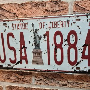 TIN METAL SIGN EMBOSSED