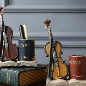 VINTAGE FIGURE VIOLIN ON BOOK & PEN HOLDER RESIN MATERIAL